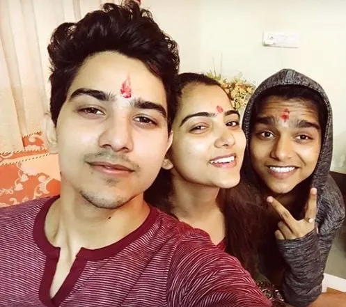 Rohit Chandel with his siblings