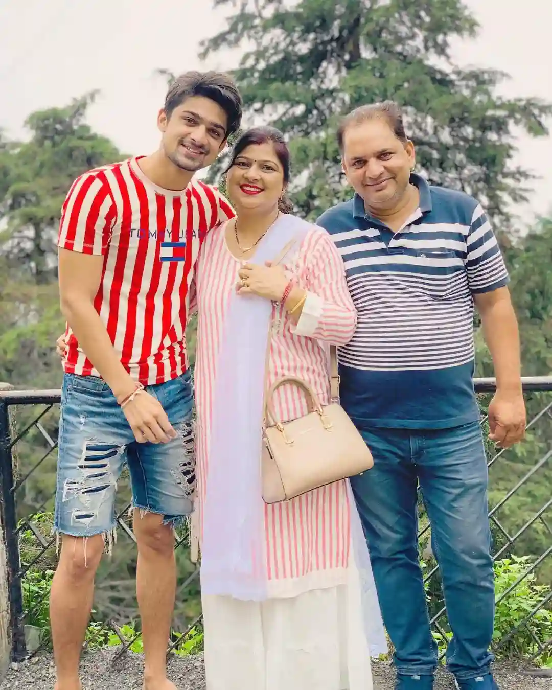 Abhishek Kumar with his father and mother